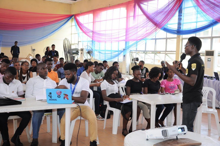 Participants at a Roothub Tech101 training session documented in the University of Uyo outreach
